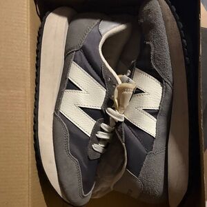 Gray and White women’s 237 Sneakers